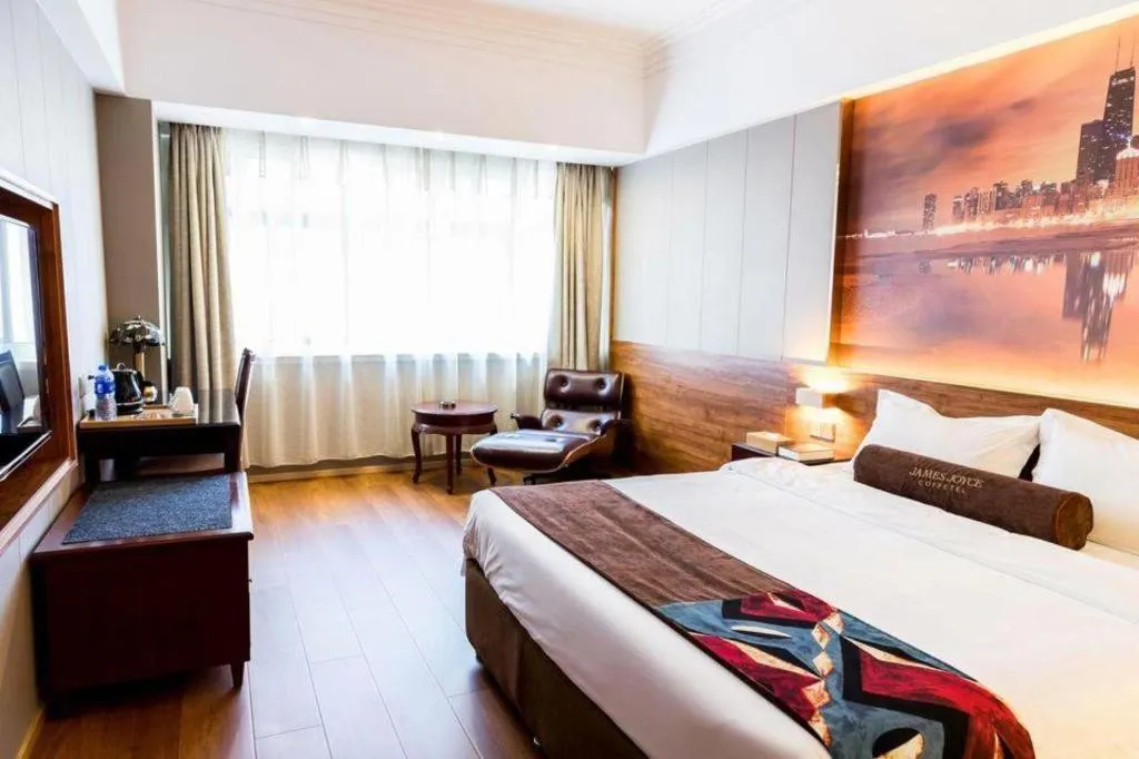 Bed in James Joyce Coffetel Qinhuangdao Taiyangcheng Wenhua Road