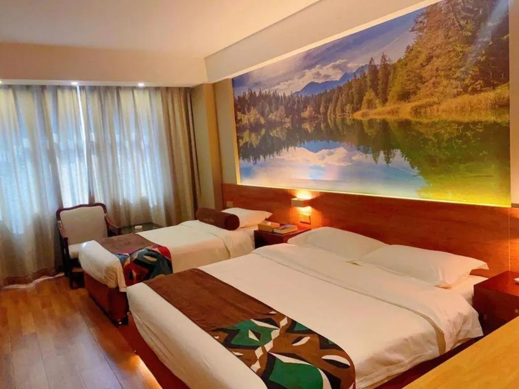 Bed in James Joyce Coffetel Qinhuangdao Taiyangcheng Wenhua Road