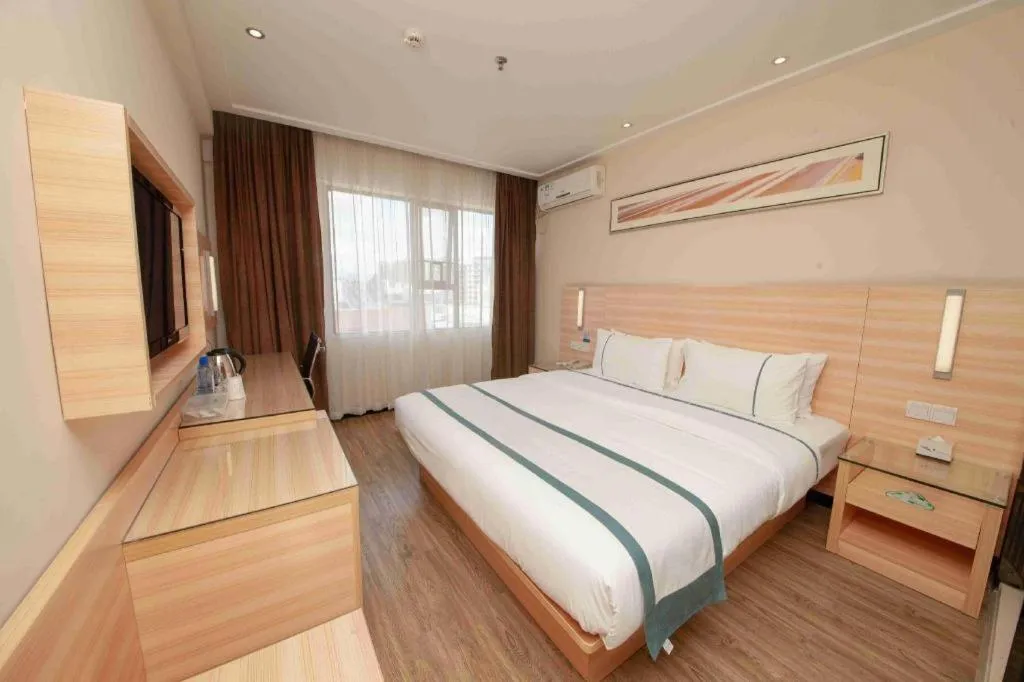 Bed in City Comfort Inn Yulin Wenhua Square Wanda Plaza