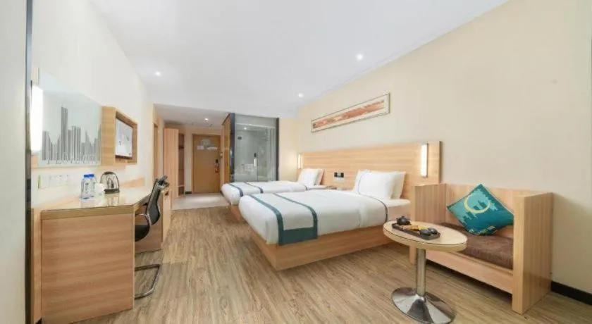 Bed in City Comfort Inn Yulin Wenhua Square Wanda Plaza