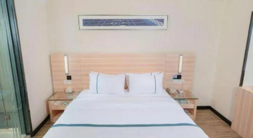 Bed in City Comfort Inn Yulin Wenhua Square Wanda Plaza