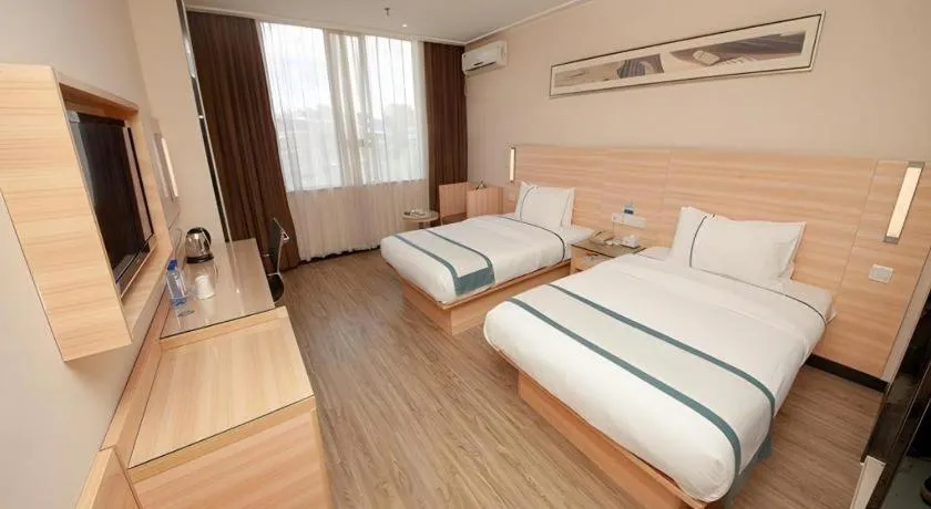 Bed in City Comfort Inn Yulin Wenhua Square Wanda Plaza