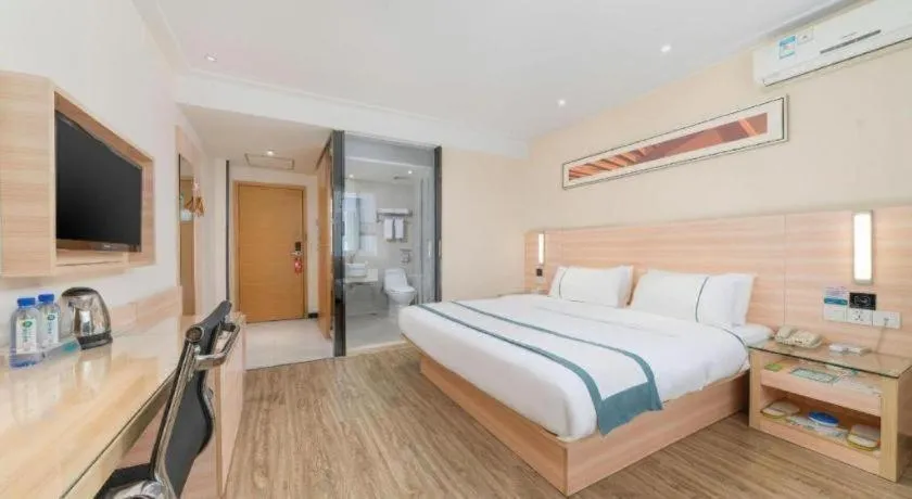 Bed in City Comfort Inn Yulin Wenhua Square Wanda Plaza