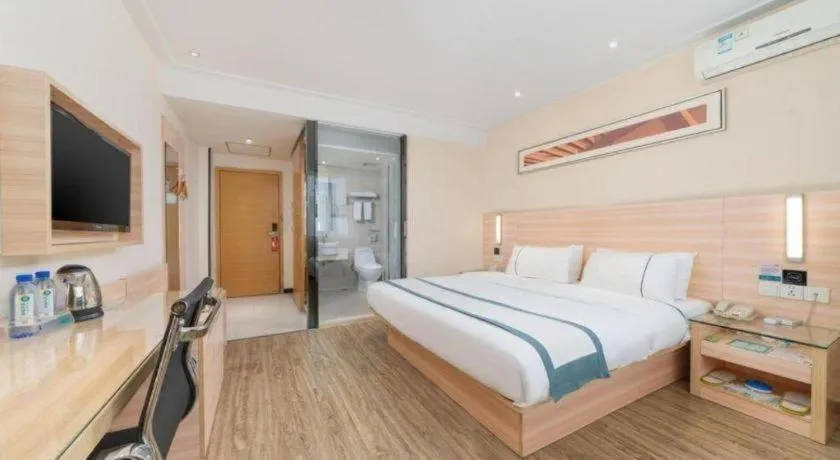 Bed in City Comfort Inn Yulin Wenhua Square Wanda Plaza