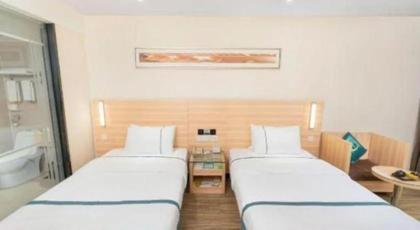 Bed in City Comfort Inn Yulin Wenhua Square Wanda Plaza