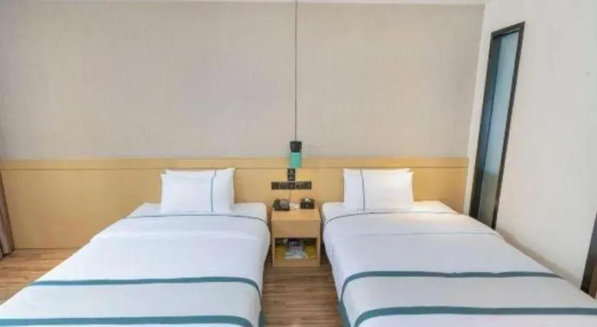 Bed in City Comfort Inn Yulin Wenhua Square Wanda Plaza