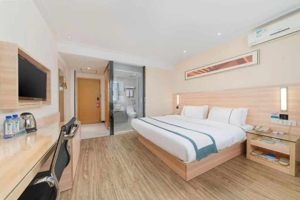 Bed in City Comfort Inn Yulin Wenhua Square Wanda Plaza