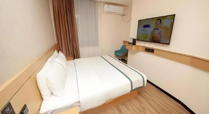 Bed in City Comfort Inn Yulin Wenhua Square Wanda Plaza