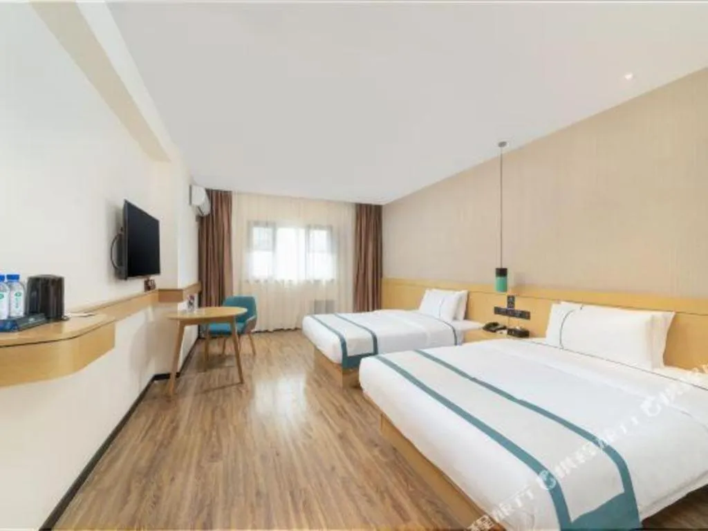 Bed in City Comfort Inn Yulin Wenhua Square Wanda Plaza