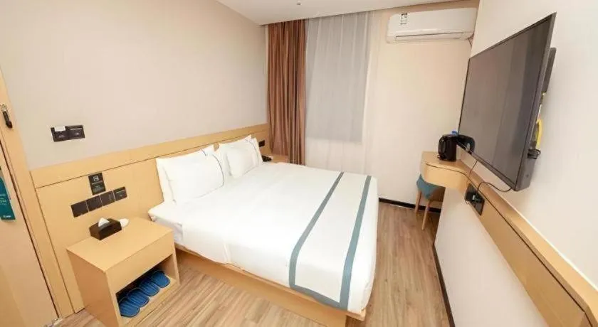 Bed in City Comfort Inn Yulin Wenhua Square Wanda Plaza