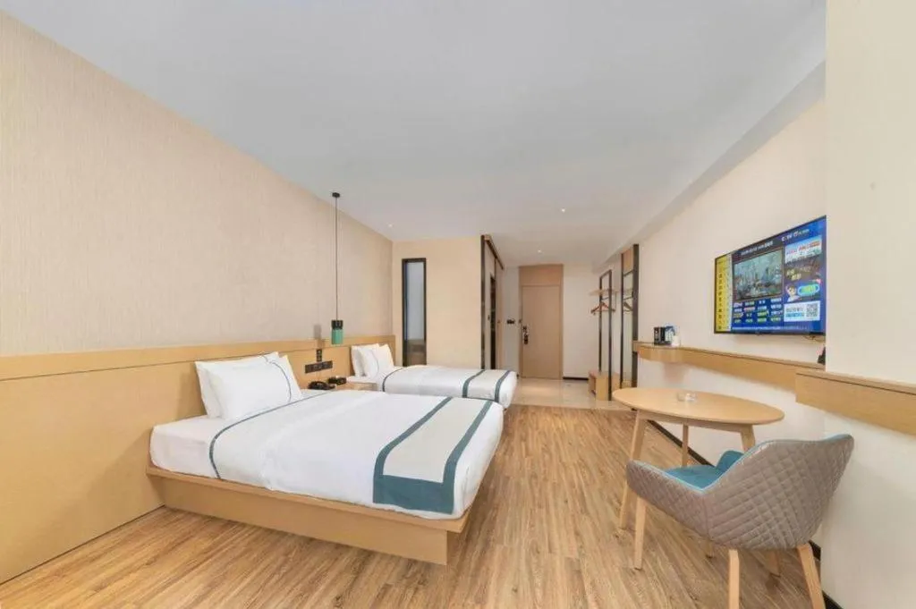 Bed in City Comfort Inn Yulin Wenhua Square Wanda Plaza