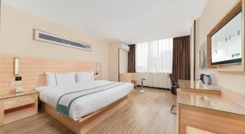 Bed in City Comfort Inn Yulin Wenhua Square Wanda Plaza