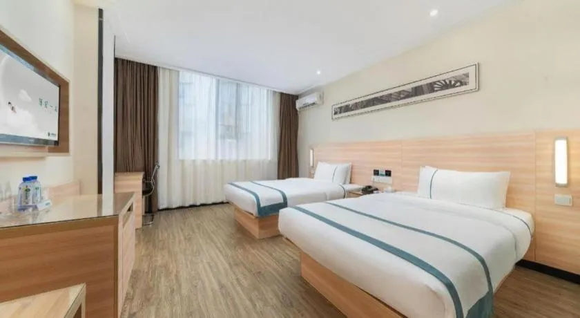 Bed in City Comfort Inn Yulin Wenhua Square Wanda Plaza