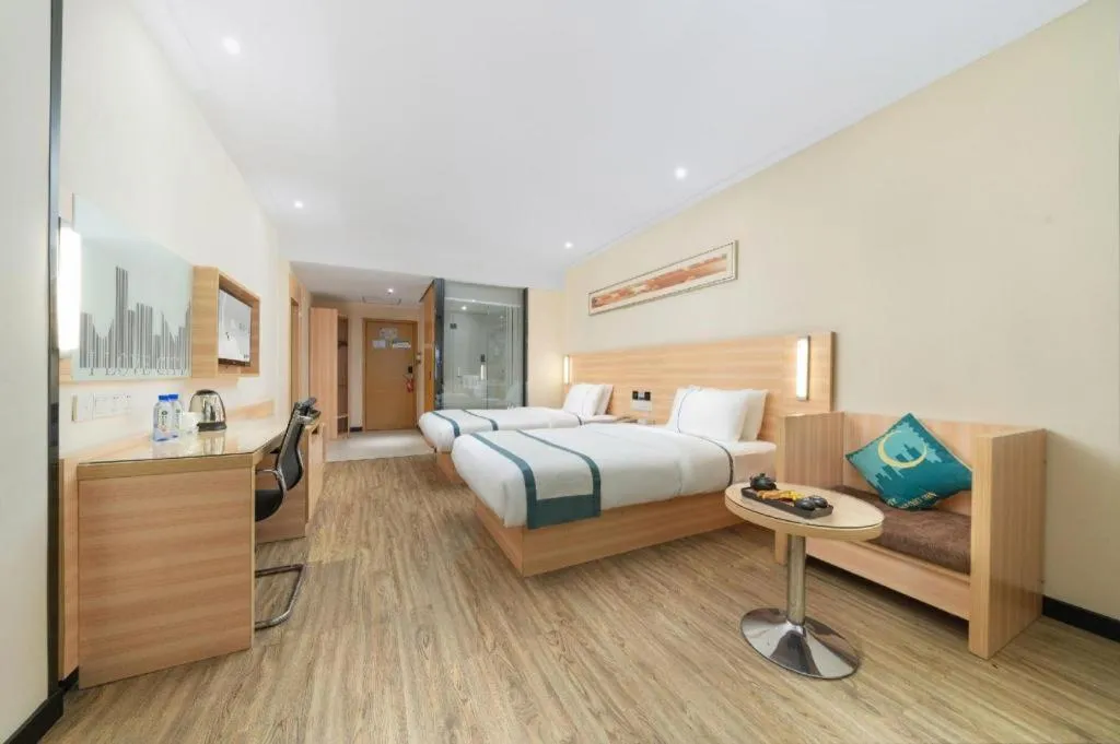 Bed in City Comfort Inn Yulin Wenhua Square Wanda Plaza