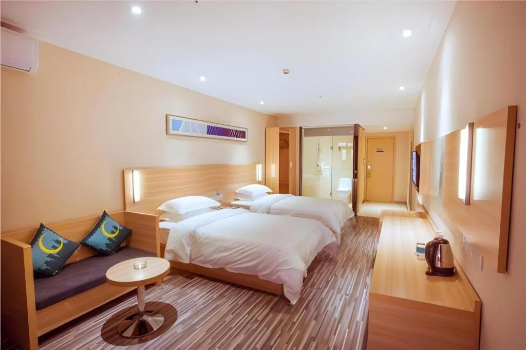 Bed in City Comfort Inn Yulin Wenhua Square Wanda Plaza