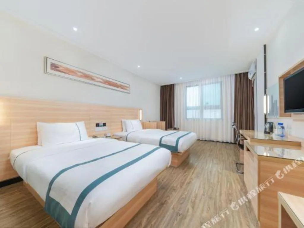 Bed in City Comfort Inn Yulin Wenhua Square Wanda Plaza