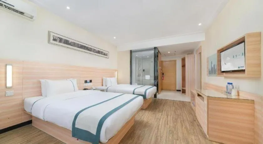 Bed in City Comfort Inn Yulin Wenhua Square Wanda Plaza