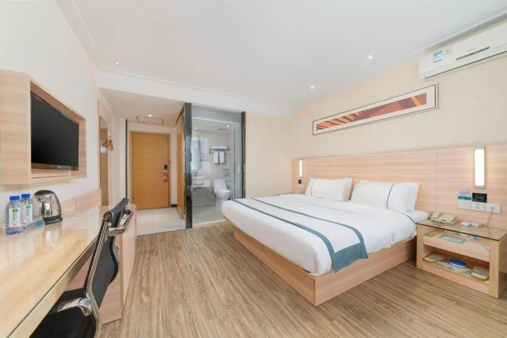 Bed in City Comfort Inn Yulin Wenhua Square Wanda Plaza