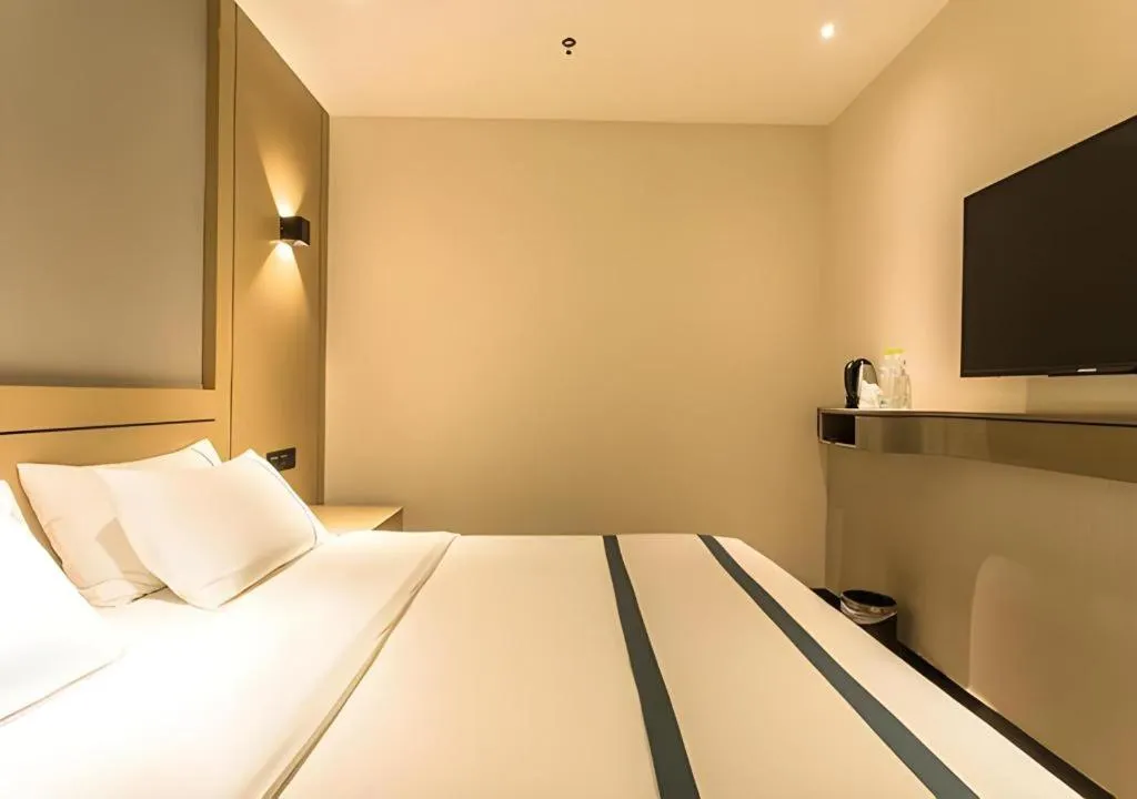 Bed in City Comfort Inn Nanning Anji Wanda Plaza