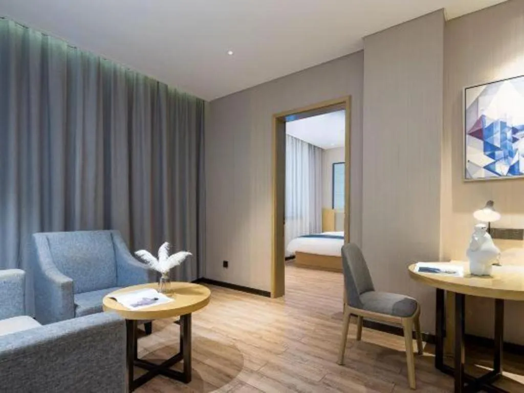 Bed in Echarm Hotel Danzhou Xiari Plaza