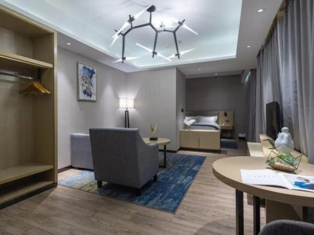 Bed in Echarm Hotel Danzhou Xiari Plaza