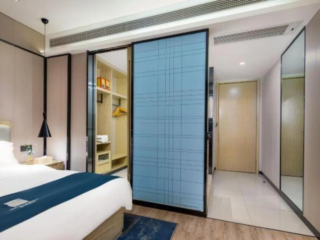 Bed in Echarm Hotel Danzhou Xiari Plaza