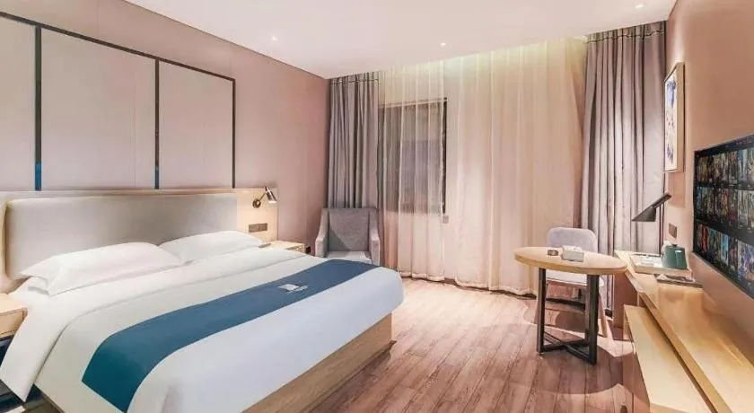 Bed in Echarm Hotel Danzhou Xiari Plaza