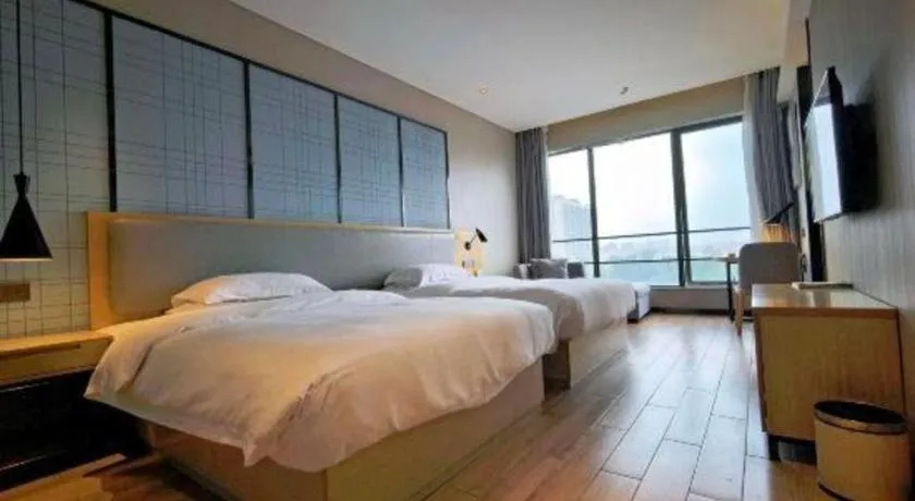 Bed in Echarm Hotel Danzhou Xiari Plaza