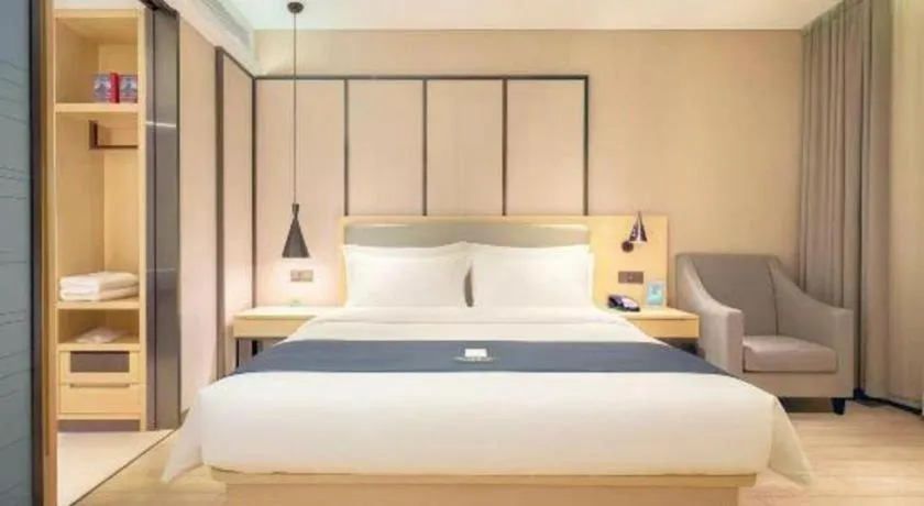 Bed in Echarm Hotel Danzhou Xiari Plaza