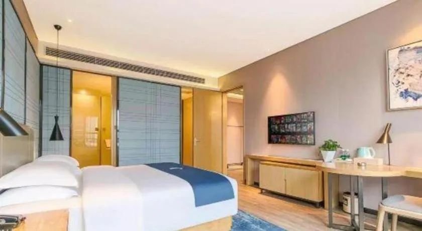 Bed in Echarm Hotel Danzhou Xiari Plaza