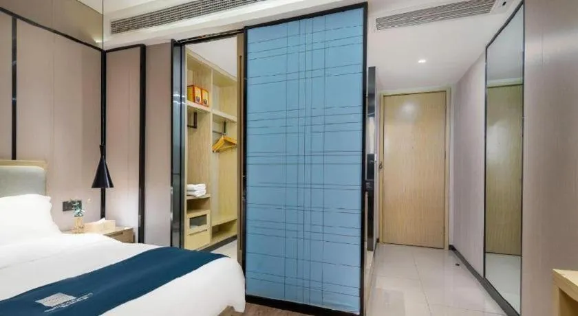 Bed in Echarm Hotel Danzhou Xiari Plaza