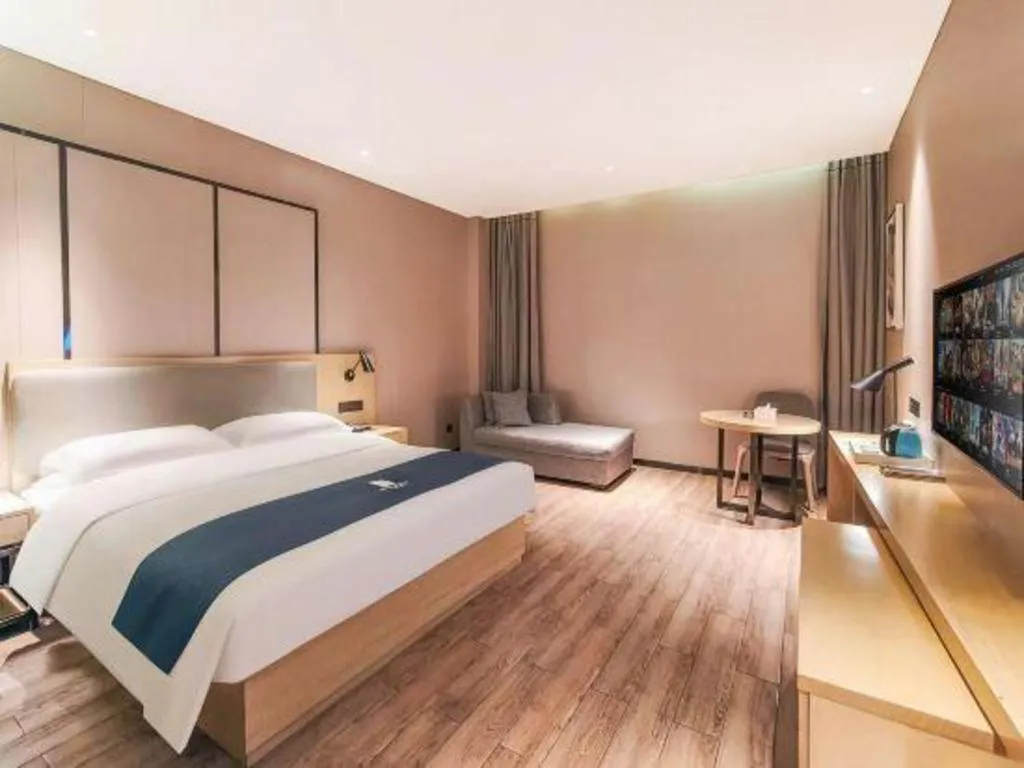 Bed in Echarm Hotel Danzhou Xiari Plaza