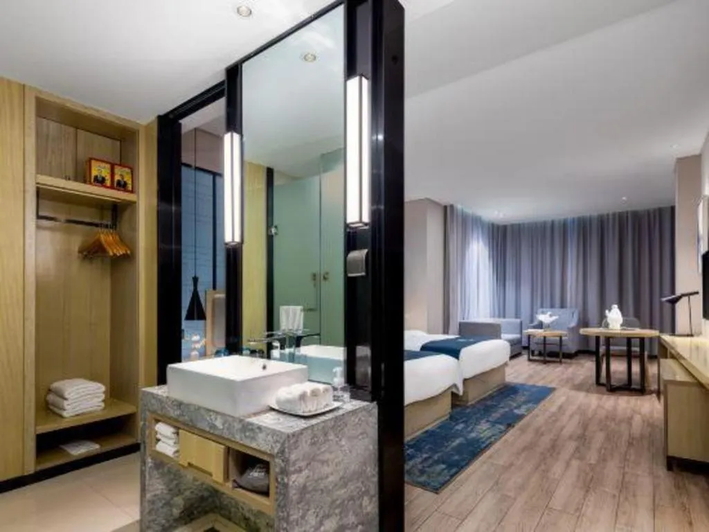 Bed in Echarm Hotel Danzhou Xiari Plaza