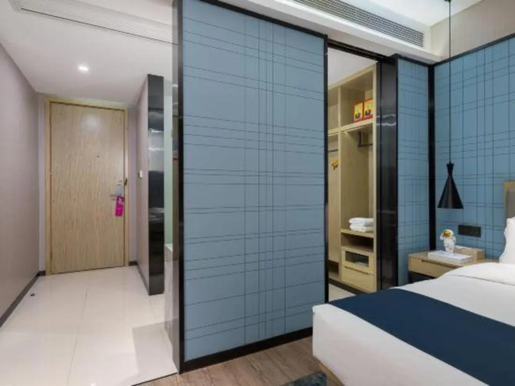 Bed in Echarm Hotel Danzhou Xiari Plaza