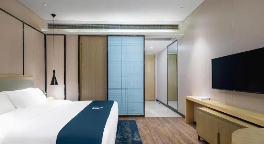 Bed in Echarm Hotel Danzhou Xiari Plaza