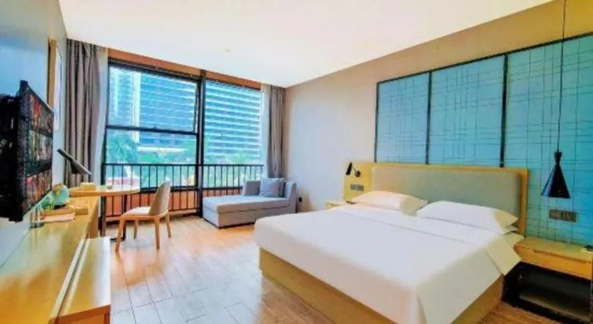 Bed in Echarm Hotel Danzhou Xiari Plaza