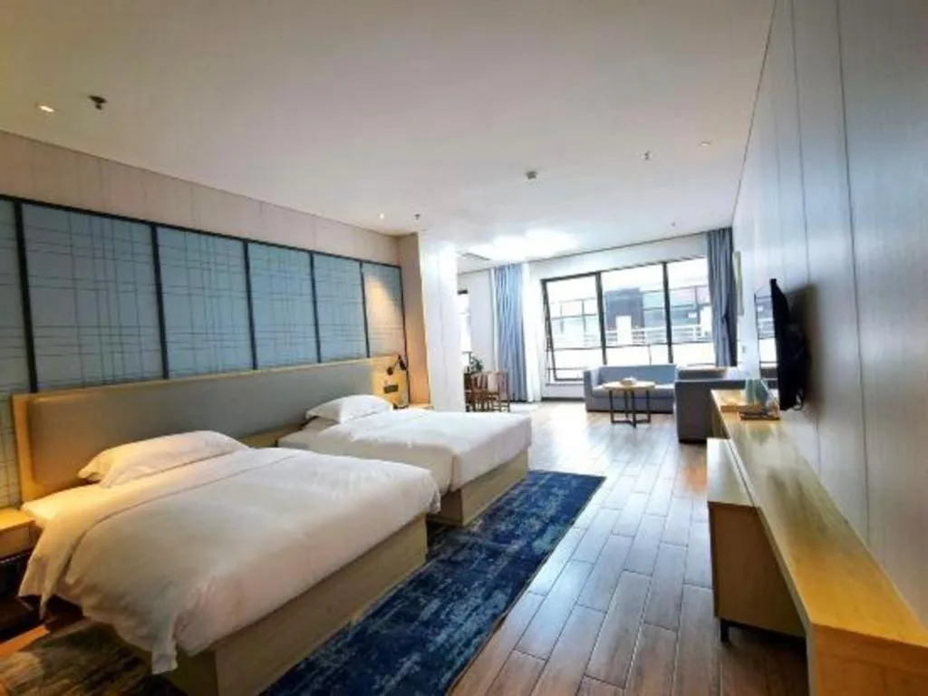 Bed in Echarm Hotel Danzhou Xiari Plaza