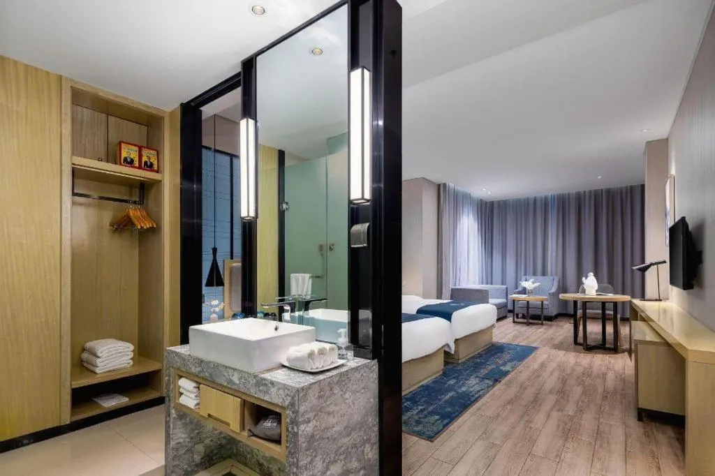 Bed in Echarm Hotel Danzhou Xiari Plaza