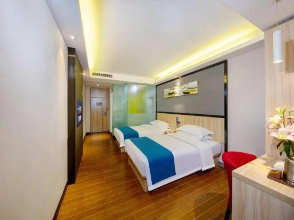 Bed in Wenxing Hotel Guangzhou Gangding Metro Station Branch