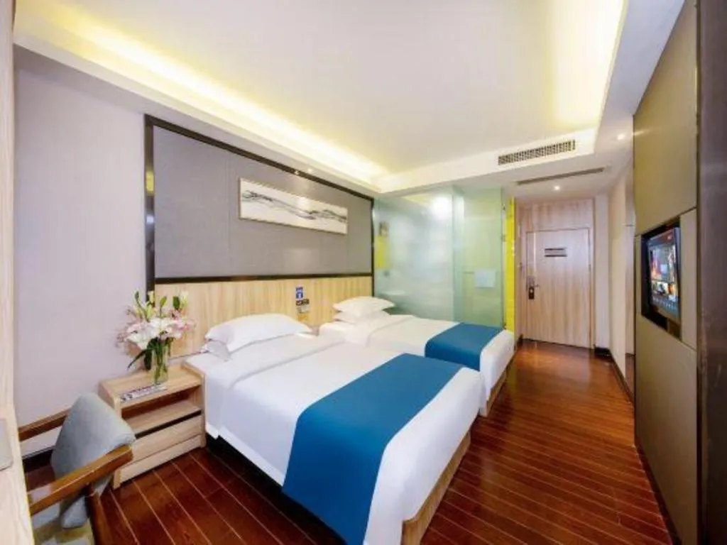 Bed in Wenxing Hotel Guangzhou Gangding Metro Station Branch