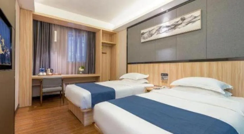 Bed in Wenxing Hotel Guangzhou Gangding Metro Station Branch