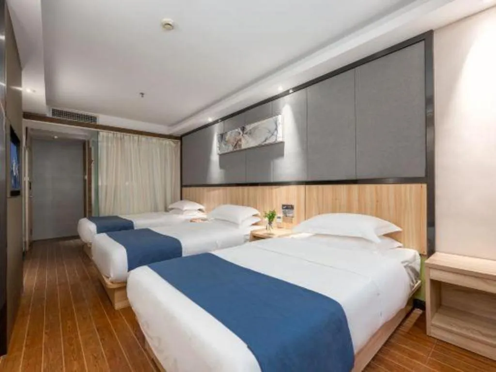 Bed in Wenxing Hotel Guangzhou Gangding Metro Station Branch