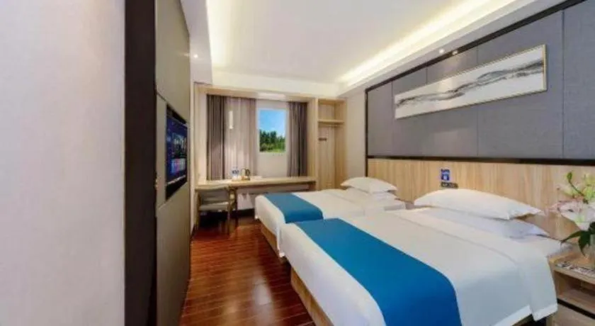 Bed in Wenxing Hotel Guangzhou Gangding Metro Station Branch