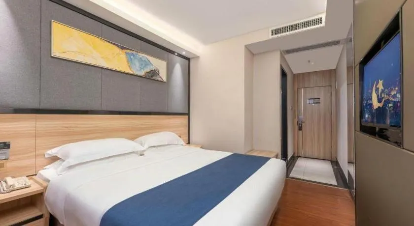 Bed in Wenxing Hotel Guangzhou Gangding Metro Station Branch