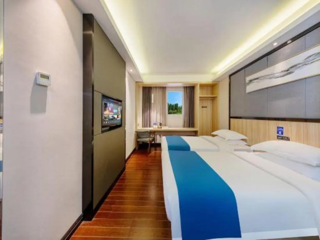 Bed in Wenxing Hotel Guangzhou Gangding Metro Station Branch