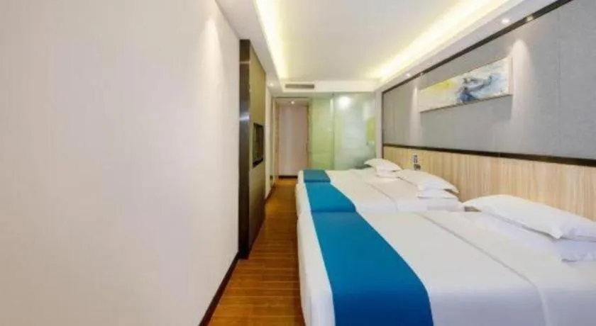 Bed in Wenxing Hotel Guangzhou Gangding Metro Station Branch