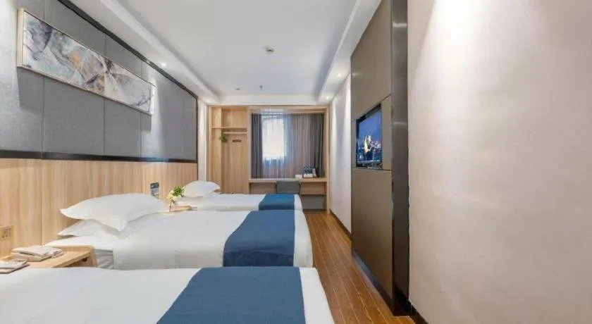 Bed in Wenxing Hotel Guangzhou Gangding Metro Station Branch