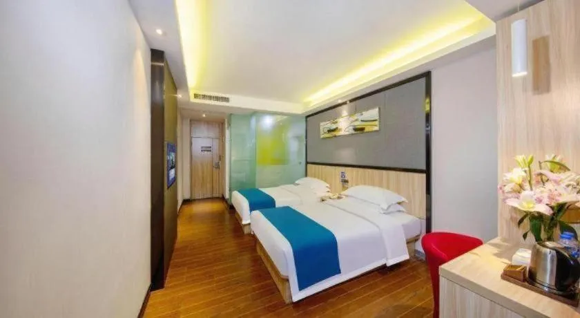 Bed in Wenxing Hotel Guangzhou Gangding Metro Station Branch