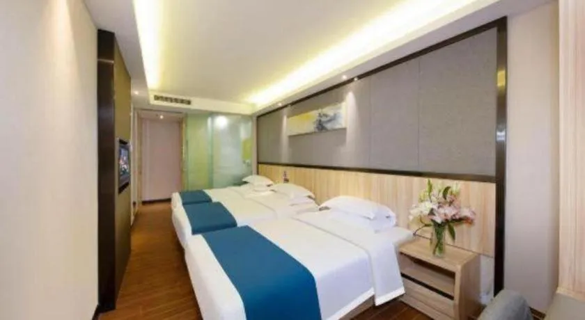 Bed in Wenxing Hotel Guangzhou Gangding Metro Station Branch