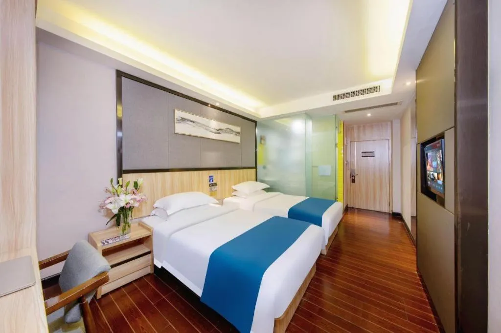 Bed in Wenxing Hotel Guangzhou Gangding Metro Station Branch